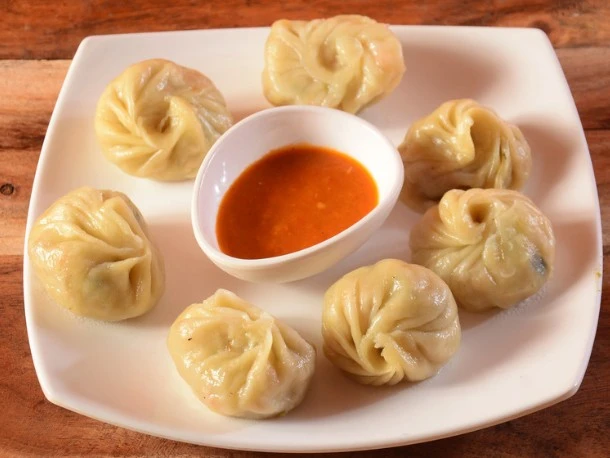 Delicious Chicken Steam Momos at Desi Adda Bar And Grill in Edmonton, AB